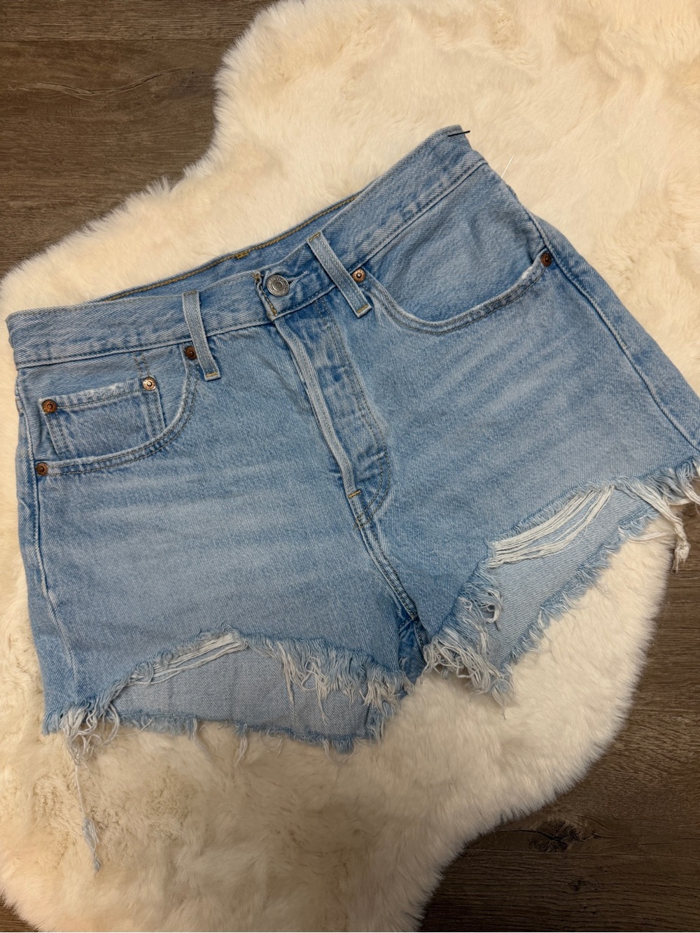 Levi's Light Wash Frayed Hem Denim Shorts